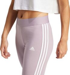 Adidas Legginsy damskie adidas Loungewear Essentials 3-Stripes różowe IR5347 XS. Czerwone legginsy damskie Adidas, bez wzorów. Za 120.81 zł.