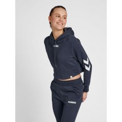Damska bluza z kapturem crop top Hummel hmlLEGACY. Niebieskie bluzy damskie Hummel, s, bez wzorów, sportowe, bez ramiączek, z kapturem. Za 167.50 zł.