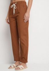 Brązowe Bawełniane Spodnie z Wiązaniem Galtebis. Brązowe spodnie materiałowe damskie Born2be, bez wzorów, z bawełny, eleganckie. Za 59.99 zł.