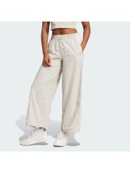 Adidas Spodnie dresowe Essentials 3-Stripes JC8168 Beżowy Loose Fit. Brązowe spodnie dresowe damskie Adidas, bez wzorów, z dresówki. Za 219.99 zł.