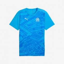 Koszulka piłkarska przedmeczowa Puma Olympique Marsylia 24/25. Bluzki damskie Puma, s, bez wzorów, z materiału, sportowe, bez kołnierzyka, bez ramiączek. W wyprzedaży za 249.99 zł.