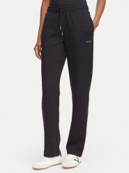 Guess Spodnie dresowe V6YB25 K4803 Czarny Regular Fit. Czarne spodnie dresowe damskie Guess, z aplikacjami, z dresówki. Za 344.99 zł.