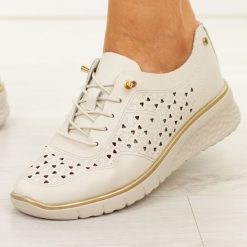 Beżowe skórzane ażurowe półbuty damskie Filippo Dp6714/26. Brązowe półbuty damskie Filippo, na jesień, w ażurowe wzory, z jeansu, z okrągłym noskiem, bez obcasa, na koturnie, bez zapięcia. Za 219.00 zł.