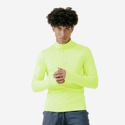 Bluza do biegania męska Kalenji Run 100 Warm Visibilite. Żółte bluzy męskie KALENJI, m, bez wzorów, z bawełny, sportowe, bez ramiączek, bez kaptura. Za 59.99 zł.