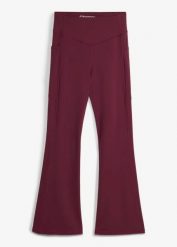 Wygodne legginsy sportowe z kieszonką na telefon i poszerzanymi nogawkami, z szybkoschnącego materiału. Czarne legginsy damskie bonprix, bez wzorów, z materiału. Za 112.99 zł.