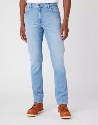WRANGLER TEXAS SLIM MĘSKE SPODNIE JEANSOWE BLUE CHAMP W12SYI29K 112145802. Niebieskie spodnie materiałowe męskie Wrangler, bez wzorów, z bawełny. W wyprzedaży za 114.99 zł.