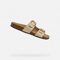 Sandały GEOX D BRIONIA Beżowy. Żółte sandały damskie Geox, bez wzorów, ze skóry, bez obcasa, bez zapięcia. Za 313.99 zł.