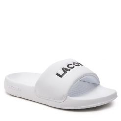 Klapki Lacoste. Białe klapki damskie Lacoste, bez wzorów, bez obcasa, bez zapięcia. Za 199.99 zł.
