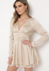 Beżowa Satynowa Sukienka Mini z Głębokim Dekoltem i Wiązaniem z Tyłu Liadan. Brązowe sukienki damskie Born2be, na imprezę, m, bez wzorów, z satyny, eleganckie, bez kołnierzyka, bez ramiączek, mini. Za 89.99 zł.