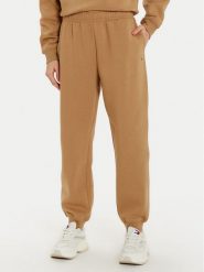 Tommy Hilfiger Spodnie dresowe Essential WW0WW45966 Beżowy Regular Fit. Brązowe spodnie dresowe damskie Tommy Hilfiger, bez wzorów, z bawełny. Za 299.99 zł.