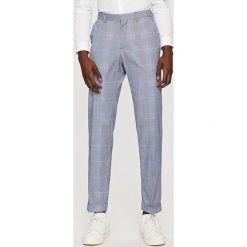 Spodnie garniturowe w kratę - Niebieski. Niebieskie eleganckie spodnie męskie Reserved, m, bez wzorów. Za 169.99 zł.