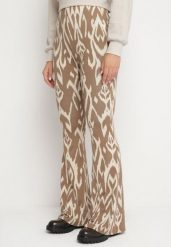 Beżowy Spodnie Typu Dzwony z Wysokim Stanem z Gumką w Pasie Zaimi. Brązowe spodnie materiałowe damskie Born2be, bez wzorów, z jeansu, klasyczne, z podwyższonym stanem. Za 39.99 zł.