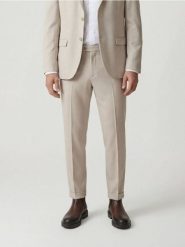 Garniturowe spodnie w kant - beżowy. Brązowe garnitury męskie Reserved, bez wzorów, z tkaniny. Za 169.99 zł.