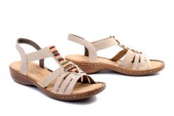 RIEKER 60851-62 beige, sandały damskie. Brązowe sandały damskie Rieker, bez wzorów, bez obcasa, bez zapięcia. Za 299.90 zł.