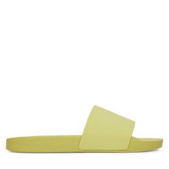 Klapki Calvin Klein Jeans. Żółte klapki damskie Calvin Klein Jeans, bez wzorów, z jeansu, bez obcasa, bez zapięcia. Za 199.99 zł.