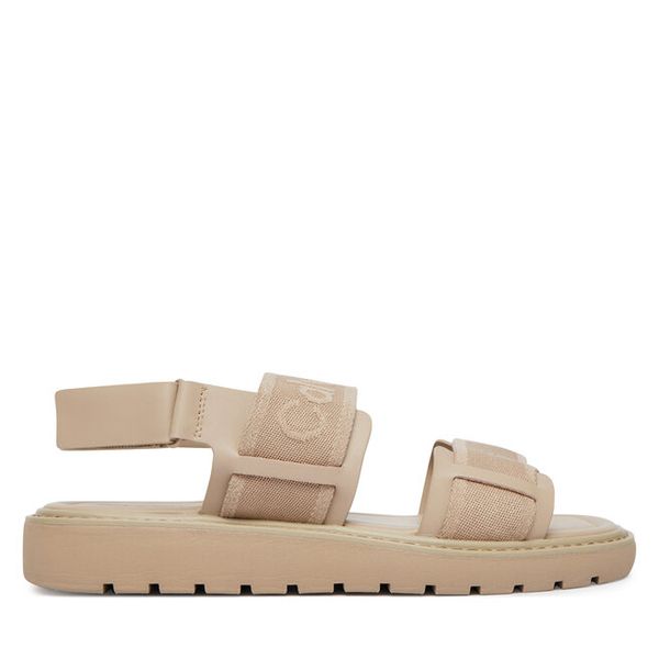 Sandały Calvin Klein. Brązowe sandały damskie Calvin Klein, bez wzorów, bez obcasa, na płaskiej podeszwie, bez zapięcia. Za 250.99 zł.