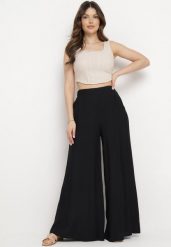 Czarne Szerokie Spodnie z Elastyczną Gumką w Pasie i Kieszeniami Atealis. Czarne spodnie materiałowe damskie Born2be, bez wzorów, z jeansu, eleganckie. Za 74.99 zł.