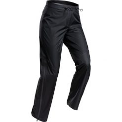Spodnie turystyczne wierzchnie - MH500 WTP - damskie. Brązowe spodnie sportowe damskie QUECHUA, bez wzorów, z materiału, sportowe, trekkingowe. Za 169.99 zł.