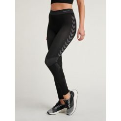 Damskie legginsy Hummel Seamless. Białe legginsy damskie Hummel, bez wzorów, z materiału. Za 100.00 zł.