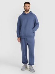 4F Spodnie dresowe joggery męskie - niebieskie 3XL. Niebieskie spodnie materiałowe męskie 4F, bez wzorów, z bawełny. Za 149.99 zł.
