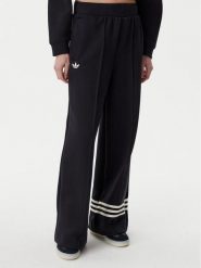 Adidas Spodnie dresowe adicolor Neuclassics JI8516 Czarny Loose Fit. Czarne spodnie dresowe damskie Adidas, bez wzorów, z bawełny. Za 328.99 zł.