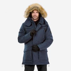 Parka turystyczna męska zimowa Quechua NH900 -20°C wodoodporna. Niebieskie parki męskie QUECHUA, na zimę, m, bez wzorów, z syntetyku, sportowe, bez kołnierzyka, bez kaptura. Za 499.99 zł.
