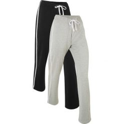 Spodnie dresowe z grubej bawełny (2 pary). Czarne spodnie dresowe damskie bonprix, bez wzorów, z bawełny, sportowe. Za 149.99 zł.