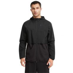 Kurtka sportowa męska Puma Train Woven Ultra. Czarne kurtki sportowe męskie Puma, m, bez wzorów, z nylonu, bez kaptura, do biegania. Za 276.00 zł.