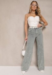 Jasnoniebieskie Jeansy High Waist o Szerokim Kroju z Cyrkoniami i Koralikami Heltewi. Niebieskie jeansy damskie Renee, z aplikacjami, z jeansu, eleganckie, z podwyższonym stanem. Za 139.99 zł.
