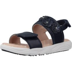 Sandały GEOX J SANDAL DEAPHNE GIR Niebieski. Niebieskie sandały damskie Geox, bez wzorów, ze skóry, bez obcasa, bez zapięcia. Za 189.99 zł.