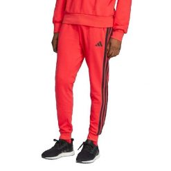 Spodnie Mężczyzna Adidas Essential 3 Stripes czerwony. Czerwone spodnie sportowe męskie Adidas, m, bez wzorów, z dresówki. Za 210.80 zł.