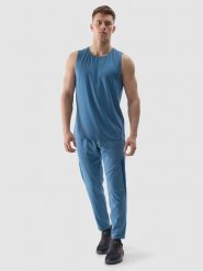 4F Spodnie treningowe szybkoschnące męskie - niebieskie 3XL. Niebieskie spodnie sportowe męskie 4F, l, bez wzorów, z dzianiny, na fitness i siłownię. W wyprzedaży za 79.99 zł.