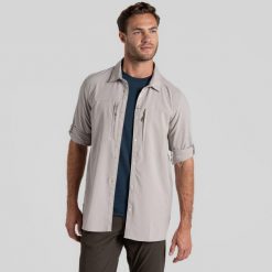 Koszula podróżnicza męska Craghoppers NosiLife Pro LS Shirt V. Zielone koszule męskie Craghoppers, m, bez wzorów, casualowe, bez kołnierzyka, bez ramiączek. Za 429.99 zł.