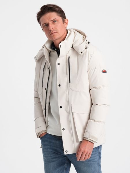 Zimowa kurtka męska z odpinanym kapturem i kieszeniami cargo - kremowa V2 - Rozmiar: XXL. Białe kurtki męskie Ombre Clothing, na zimę, m, bez wzorów. W wyprzedaży za 259.99 zł.
