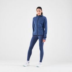 Legginsy do biegania damskie Kiprun Run 500 Warm ocieplane. Niebieskie legginsy damskie KIPRUN, bez wzorów, z elastanu. Za 139.99 zł.