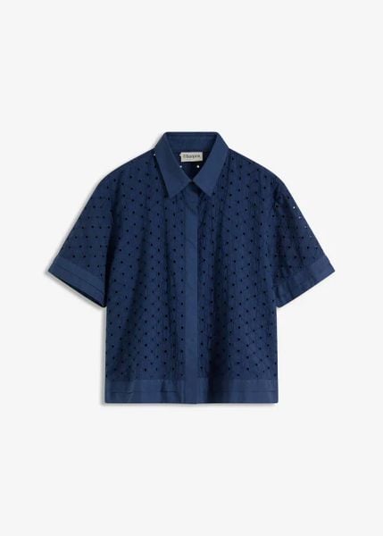 Bluzka z ażurowym haftem. Niebieskie bluzki damskie bonprix, w ażurowe wzory, eleganckie, bez kołnierzyka, bez ramiączek. Za 79.99 zł.