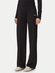 Guess Spodnie dresowe V6BB18 K6353 Czarny Regular Fit. Czarne spodnie dresowe damskie Guess, z aplikacjami, z dresówki. Za 394.99 zł.