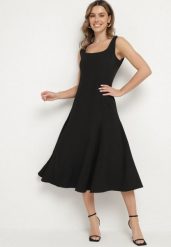 Czarna Klasyczna Sukienka o Rozkloszowanym Kroju Delure. Czarne sukienki damskie Born2be, l, z aplikacjami, eleganckie, bez kołnierzyka, bez ramiączek, midi, rozkloszowane. Za 99.99 zł.