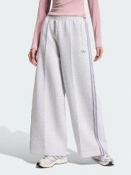 Adidas Spodnie dresowe Spacer HY8044 Szary jasny Wide Leg. Szare spodnie dresowe damskie Adidas, bez wzorów, z dresówki. Za 222.99 zł.