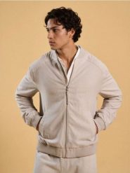 Kurtka bomberka z wiskozy - kremowy. Białe kurtki męskie Sinsay, l, bez wzorów, z wiskozy, bez kaptura. Za 99.99 zł.