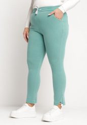 Jasnozielone Spodnie z Gumką i Sznurkiem w Pasie z Prostymi Nogawkami Averlija. Zielone spodnie materiałowe damskie Born2be, bez wzorów, z dresówki, plus size. Za 49.99 zł.