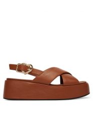 LOVE MOSCHINO Sandały JA16137I0OIA0200 Brązowy. Brązowe sandały damskie Love Moschino, bez wzorów, ze skóry, bez obcasa, na koturnie, bez zapięcia. Za 929.99 zł.