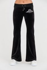 JUICY COUTURE Czarne spodnie Arched Metallic Layla. Czarne spodnie dresowe damskie Juicy Couture, bez wzorów, z dresówki. W wyprzedaży za 349.99 zł.