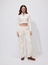 Bluza z wysoką stójką - jasnożółty. Żółte bluzy damskie Reserved, l, bez wzorów, z bawełny, bez ramiączek, bez kaptura. Za 89.99 zł.