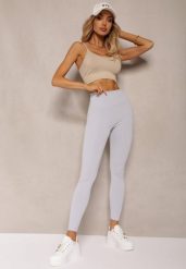 Jasnoniebieskie Sportowe Legginsy High Waist Quarefia. Niebieskie legginsy damskie Renee, l, bez wzorów, z jeansu, z podwyższonym stanem, długie, na jogę i pilates. Za 24.99 zł.