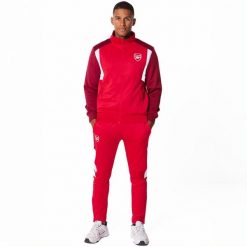 Dres piłkarski dla dorosłych Arsenal 23/24. Czerwone komplety dresowe męskie ARSENAL, xl, bez wzorów, z dresówki. Za 359.99 zł.