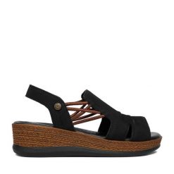 Sandały Go Soft. Czarne sandały damskie GO SOFT, bez wzorów, bez obcasa, na koturnie, bez zapięcia. Za 179.99 zł.