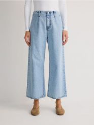 Jeansy culotte z wysokim stanem - niebieski. Niebieskie jeansy damskie Reserved, bez wzorów, z bawełny, z podwyższonym stanem. Za 139.99 zł.