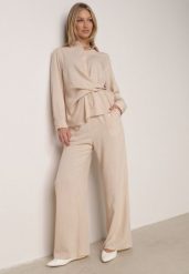 Beżowy Wiskozowy Komplet Asymetryczna Koszula i Spodnie z Kieszeniami Moneia. Brązowe koszule damskie Born2be, l, bez wzorów, z wiskozy, eleganckie, z asymetrycznym kołnierzem, bez ramiączek. Za 159.99 zł.