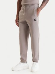 HUGO Spodnie dresowe Dimacs 50533695 Beżowy Relaxed Fit. Brązowe spodnie sportowe męskie Hugo, m, bez wzorów, z bawełny. Za 609.99 zł.